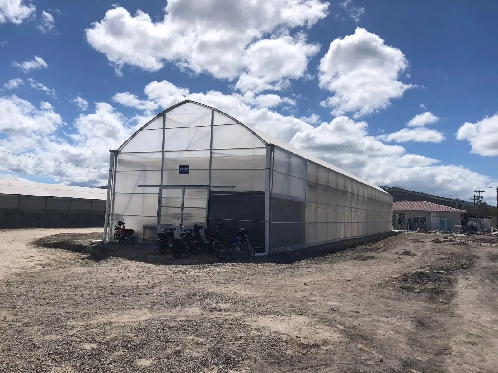 New MSC seedling house in Honduras under a blue sky